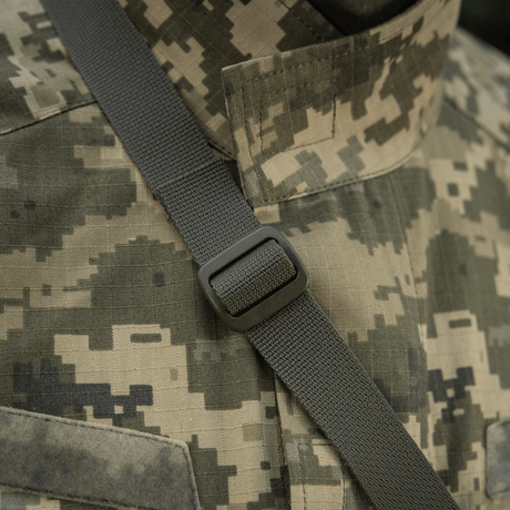 Camouflage uniform detail with strap and fastener buckle