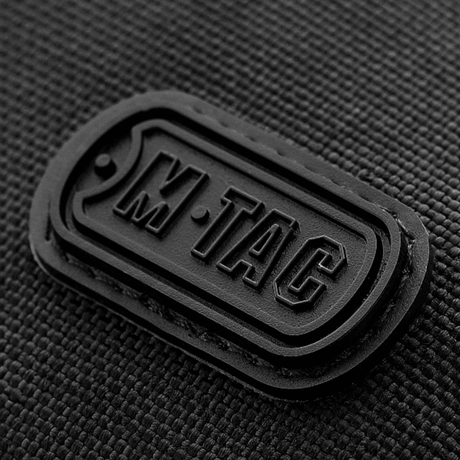 M-Tac Carry Sling Taske Elite Gen.IV, musta, kestävä tekstiili ja yksityiskohtainen kumilogo, galleria, positio 1