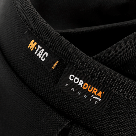 M-Tac Mag Drop Pouch Elite valmistettu kulutusta kestävästä CORDURA-kankaasta, MOLLE-kiinnikkeet nopeaan lippaiden vaihtoon.