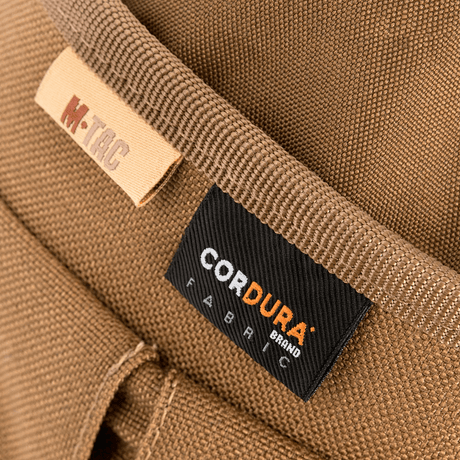M-Tac Mag Drop Pouch Elite kulutusta kestävästä CORDURA-kankaasta, MOLLE-kiinnikkeet, suunniteltu turvalliseen säilytykseen ja nopeaan lippaiden vaihtoon.