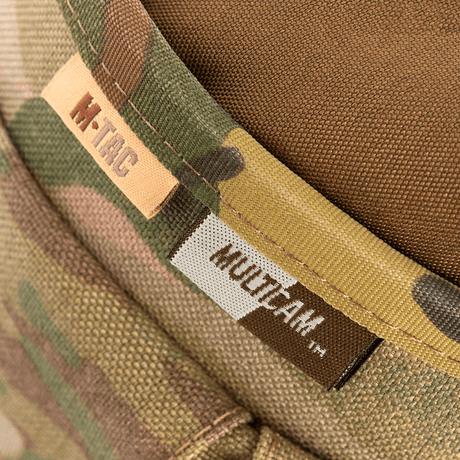 M-Tac Mag Drop Pouch Elite maastokuvioisena MOLLE-kiinnityksillä, ihanteellinen nopeaan lippaiden vaihtoon hätäuudelleenlatauksessa.