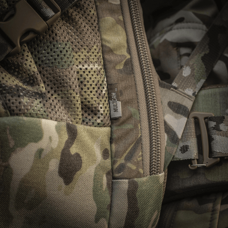 M-Tac Rygsæk Large Gen.III Elite i robust Cordura-materiale, camouflage design, tæt lukning og justerbare stropper, fokus på holdbarhed.