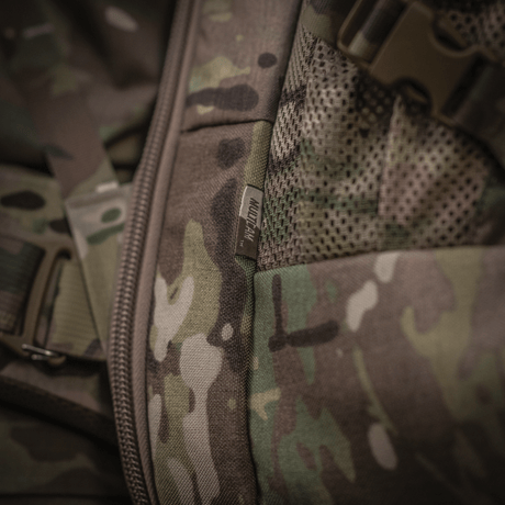 Yksityiskohta M-Tac Large Gen.IV Elite -repusta kulutusta kestävästä Cordura-materiaalista, maastokuvio, sopii ulkokäyttöön.