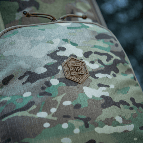 M-Tac Gun Backpack Case 125 cm Gen.II Elite camo-kuosilla ja M-Tac-logolla, tukeva asekuljetukseen ja suojaamiseen