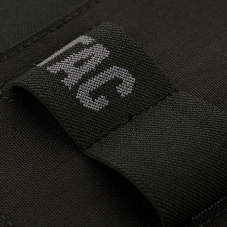 Lähikuva M-Tac Double Mag Pouch Hook Backed Magazine -koteloon, Velcro-kiinnitys lippaille tai työkaluille.