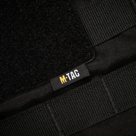 M-Tac-paneeli patchien kiinnitykseen MOLLEen 80x85 mm, hook & loop -pinta, muovialusta vakauteen ja MOLLE-kiinnitys. Mitat: 80x85 mm.
