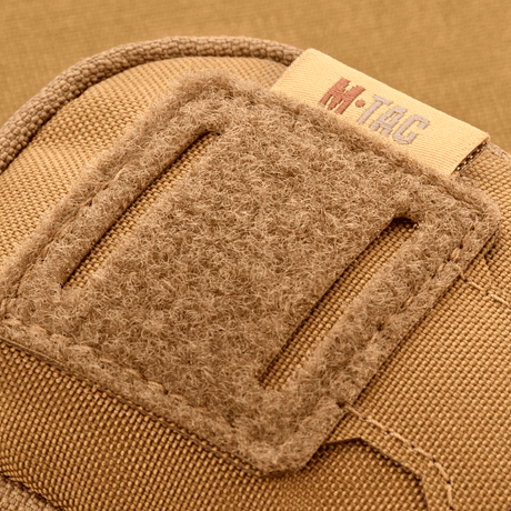 Lähikuva M-Tac PC Utility Pouch Elite Cordurasta, näyttää Velcro-paneelin ja ompeleiden yksityiskohdan