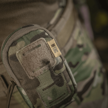 M-Tac PC Utility Pouch Elite Cordura-materiaalista MOLLE-kiinnitysjärjestelmällä, nähty camo-kuosissa