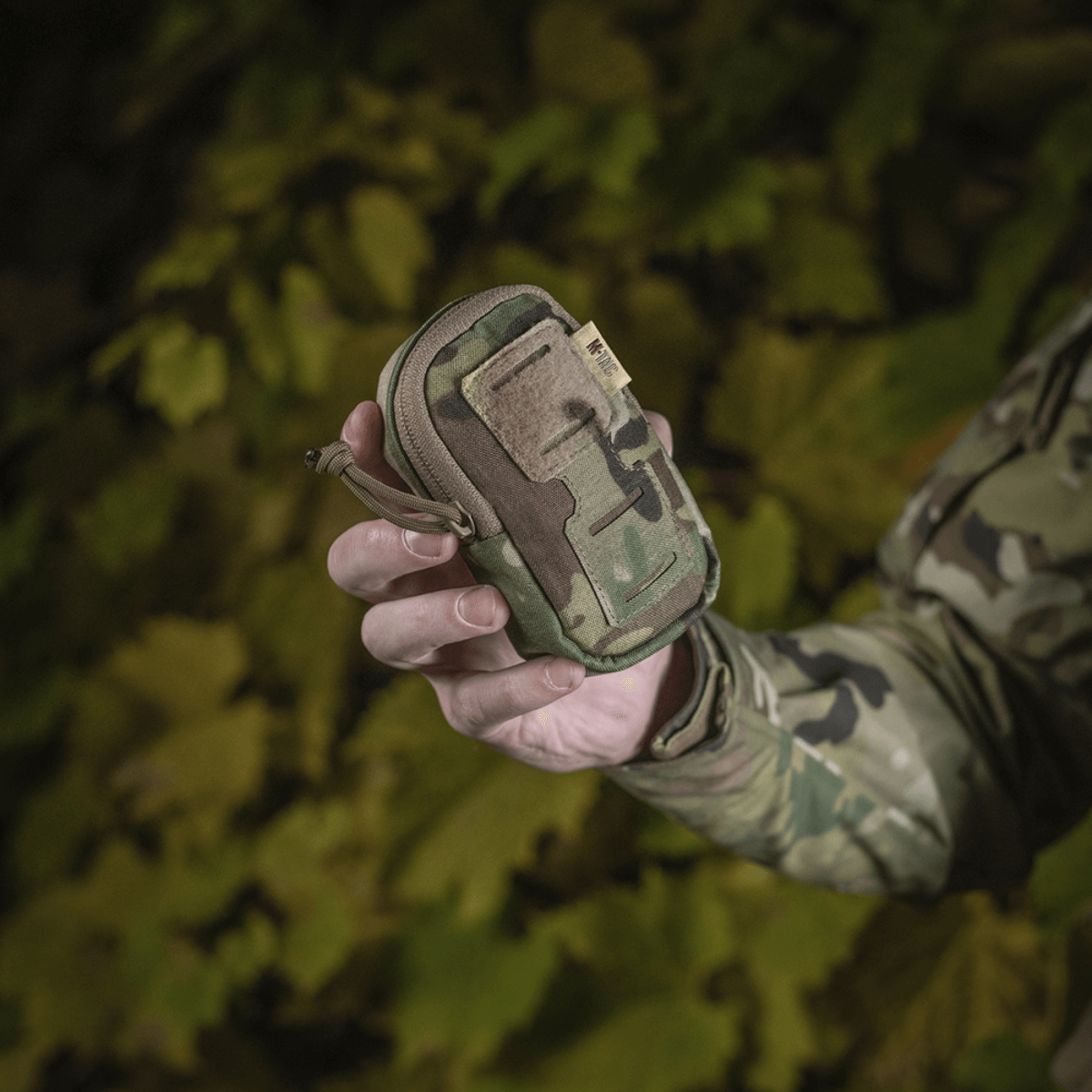 M-Tac PC Utility Pouch Elite - alsidig Cordura-pouch med MOLLE-interface, perfekt til taktisk brug. Materiale: 500D Cordura. Mål: 13x6x3 cm.