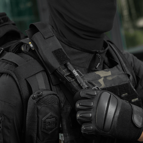 M-Tac Tourniquet Pouch Elastisk med MOLLE Gen.II taktisella liivillä nopeaan pääsyyn tourniquetiin, valmistettu Cordura Squadron -materiaalista.