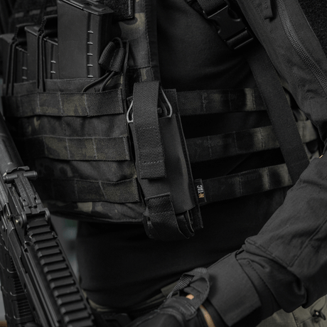 M-Tac Tourniquet Pouch Elastisk med MOLLE Gen.II kiinnitetty taktiseen varustukseen, valmistettu kestävästä Cordura Squadron -materiaalista.