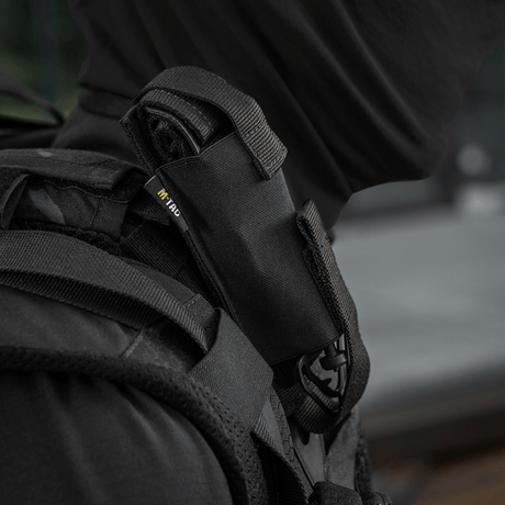 M-Tac Tourniquet Pouch Elastisk med MOLLE Gen.II kiinnitetty reppuun nopeaan ja turvalliseen tourniquetin säilytykseen.