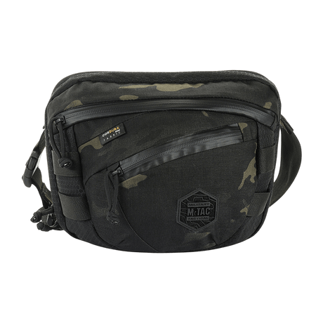 M-Tac Sphaera Hex Hardsling Taske Gen.II Elite mustana ja camouflage-designilla, kompakti ja toiminnallinen säädettävällä olkahihnalla.