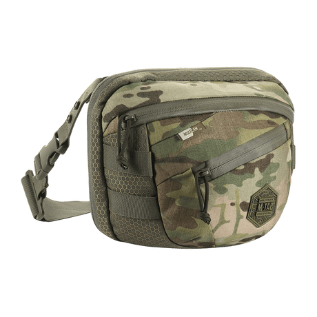 M-Tac Sphaera Hex Hardsling Taske Gen.II Elite camouflage, säädettävä hihna ja kaksi vetoketjutaskua. Kompakti ja toiminnallinen.