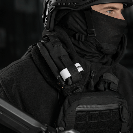 Sotilas M-Tac Elastisk Tourniquet Pouch Molle Gen.III kiinnitettynä varusteisiin.