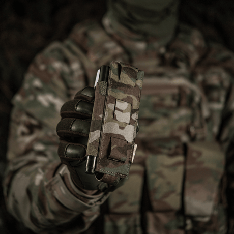 Sotilas M-Tac Elastinen Tourniquet Pouch Molle Gen.III camokuvioisessa univormussa, C-A-T-tourniquetille, 15x5 cm, nopea pääsy.