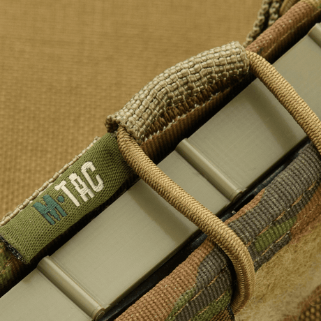 M-Tac Pistol Mag Pouch Gen.3 säädettävillä muovisilla sivulevyillä ja elastilla, valmistettu Cordura 500D:stä, yhteensopiva MOLLE-järjestelmän kanssa.
