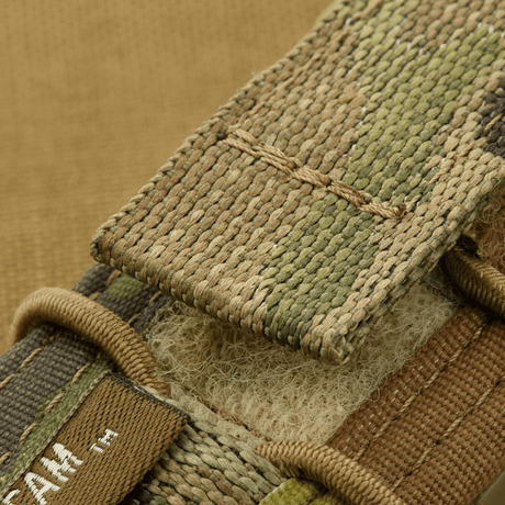 M-Tac Pistol Mag Pouch Gen.3 Cordura 500D:stä MOLLE-järjestelmällä, näyttää camo-kuosin yksityiskohdan.