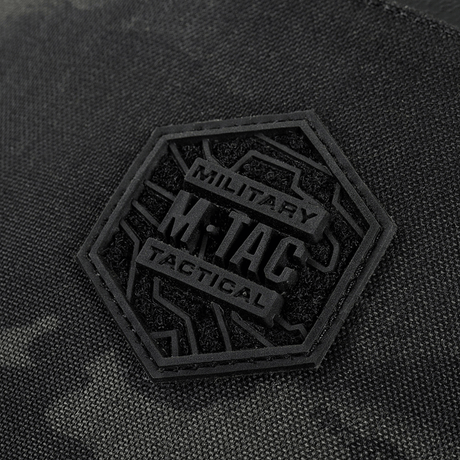 M-Tac Cross Bag Elite Hex -logo Cordura 500 -materiaalissa, sopii päivittäiseen käyttöön ja taktisiin varusteisiin, musta hexagon-embleemi.