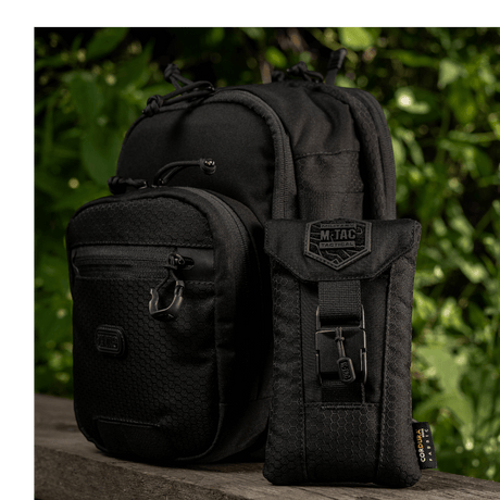 M-Tac Smartphone Lomme Elite Large Hex -mustalaukku kestävästä CORDURA HEX -materiaalista WJ-magneettisoljella, sopii 6,5 tuuman älypuhelimelle.