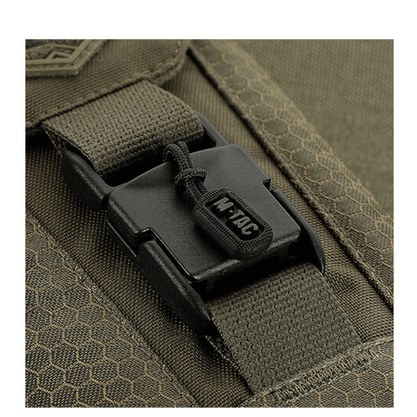 M-Tac Smartphone Lomme Elite Large Hex -magnettisoljenn yksityiskohta valmistettuna kestävästä CORDURA HEX -materiaalista.