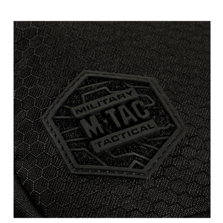 M-Tac Sling Pistoltaske Elite Hex Cordura-materiaalista ja M.Tac-logo laukun pinnalla.