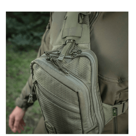 M-Tac Sling Pistoltaske Elite Hex, kestävä Cordura 1000D -laukku säädettävällä olkahihnalla ja YKK-vedoketjuilla, piilotettuun kuljetukseen.