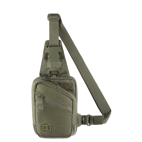 M-Tac Sling Pistoltaske Elite Hex kestävässä Cordura-materiaalissa, säädettävä hihna ja tilavat osastot.