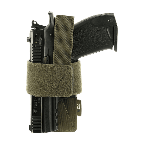 M-Tac modulaarinen universalinen Lås Light -pistoolikotelo taktiseen käyttöön ja piilotettuun kantoon, säädettävä Velcro-nauha pitää aseen paikoillaan.