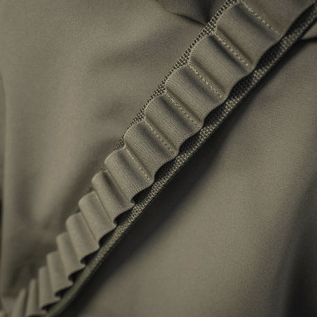 M-Tac Bandolier Elite patruunavyö lähikuva, kapasiteetti 55 patruunaa, suunniteltu nopeaan patruunoiden saatavuuteen, ergonominen ja kestävä.