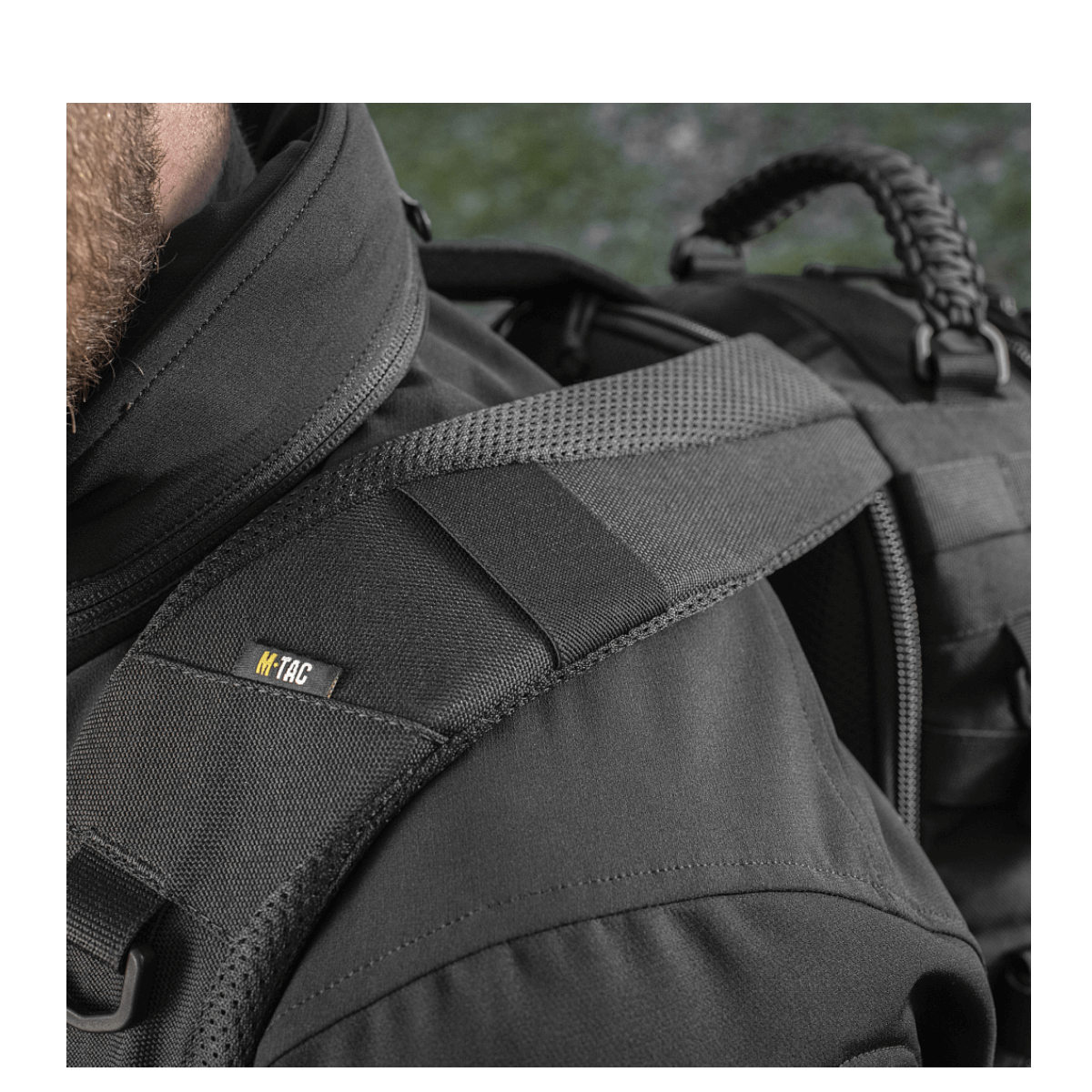 Detaljeret billede af M-Tac Mission Pack Elite rygsæk i Cordura 1000D med MOLLE LASER CUT-system for øget funktionalitet og holdbarhed.