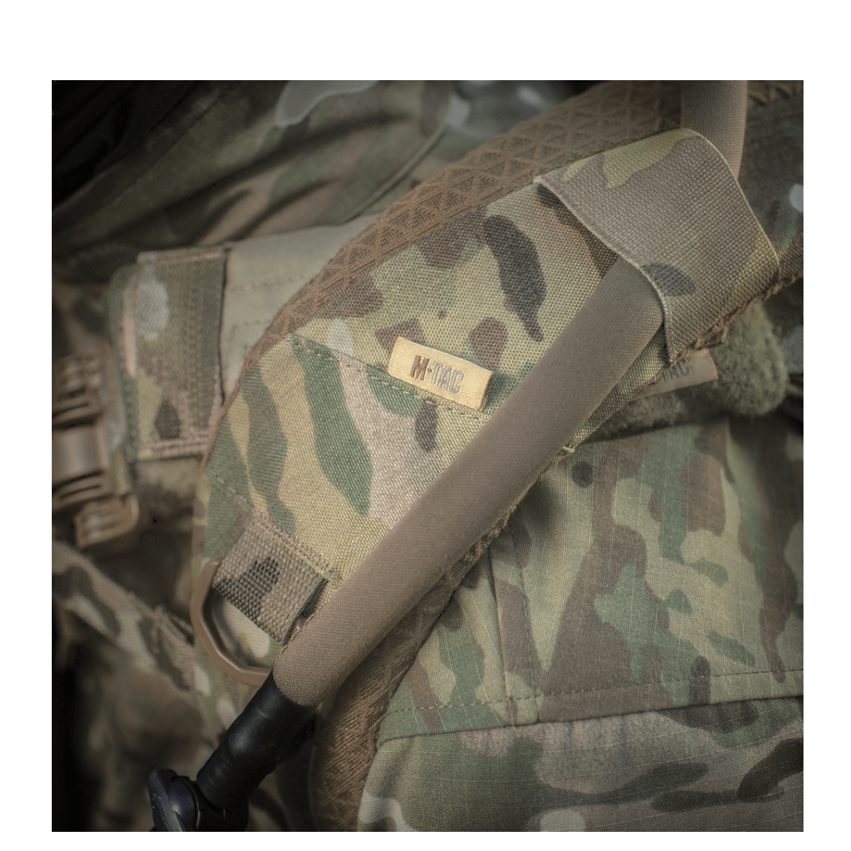 M-Tac Mission Pack Elite med slidstærkt Cordura 1000D og MOLLE LASER CUT-system i camouflage design, tæt detaljeret visning.