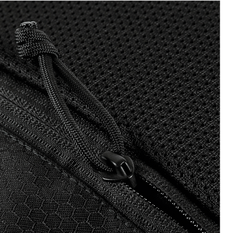 M-Tac Konvert Taske Elite, lähikuva lynlåsista ja Cordura-materiaalista.