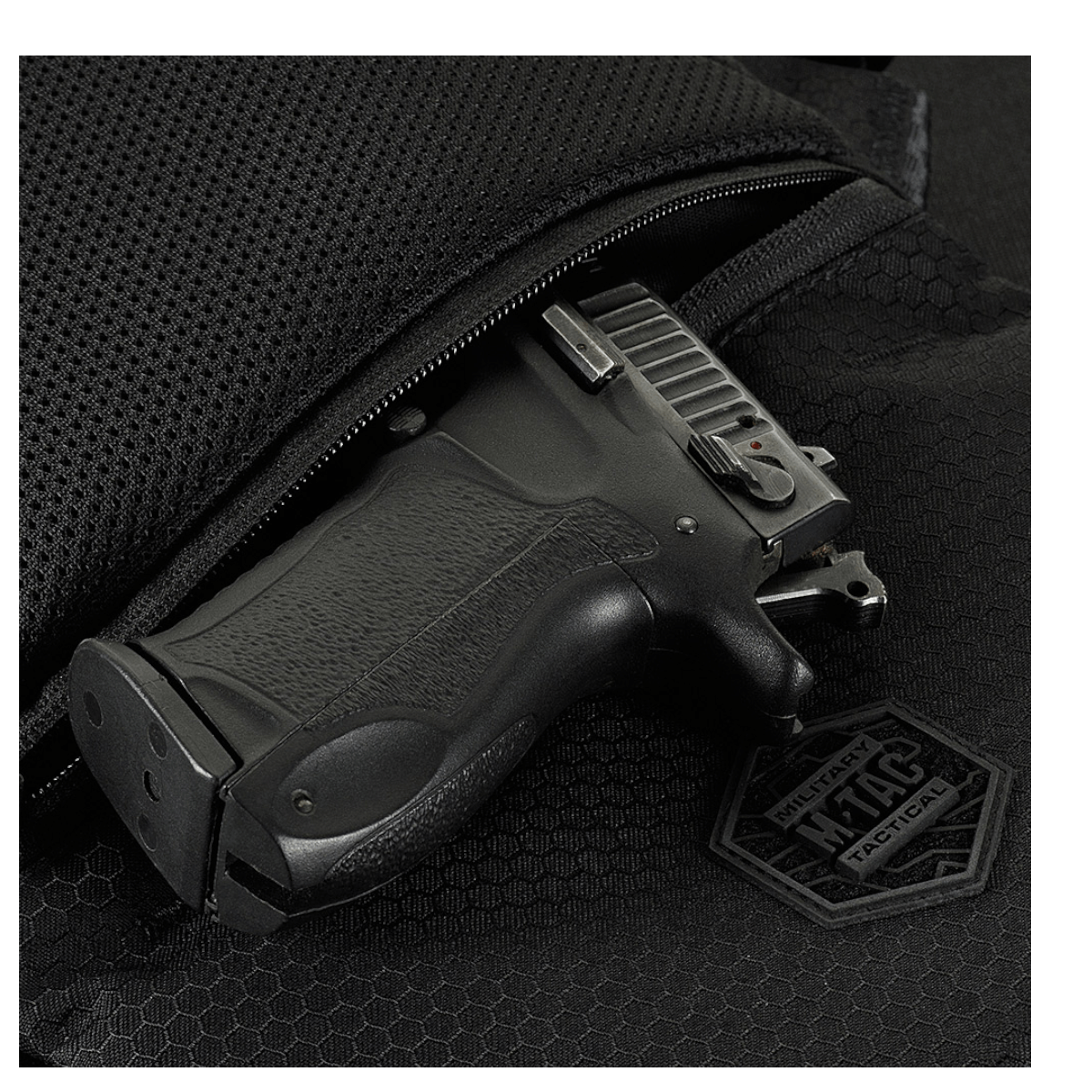 M-Tac Konvert Taske Elite med magnetventillukning, fremstillet af slidstærkt Cordura-materiale, set med dyb lomme og justerbar rem