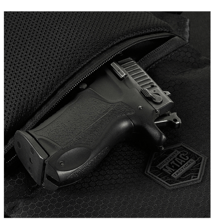 M-Tac Konvert Taske Elite magnetventillukolla, Cordura-materiaalia, näkyvissä syvä tasku ja säädettävä hihna.