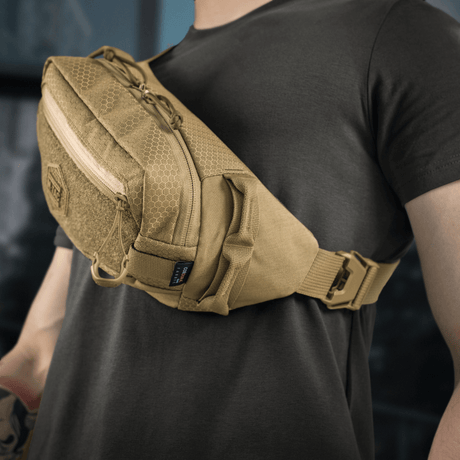 M‑Tac Bæltetaske Elite Hex Cordura-kankaasta YKK-vetoketjuilla, sopii arkeen ja taktiseen käyttöön. Kaksi lokeroa ja tarrapaneeli Hex-logolla.