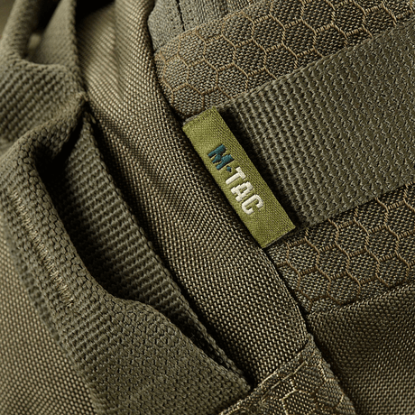 Lähikuva M‑Tac Bæltetaske Elite Hexistä kestävästä Cordura-materiaalista, tyylikäs ja ajaton ulkonäkö.