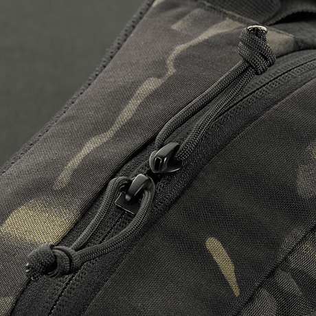 Lähikuva M‑Tac Elite Hex -vyölaukusta YKK-vetoketjulla Cordura 500D:llä, esillä taktinen muotoilu ja kestävyys.