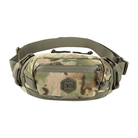 M‑Tac Elite Hex -vyölaukku camo-kuosissa, tehty Cordurasta, YKK-vetoketjut ja Woojin-soljet, sopii arkeen tai taktiseen käyttöön.