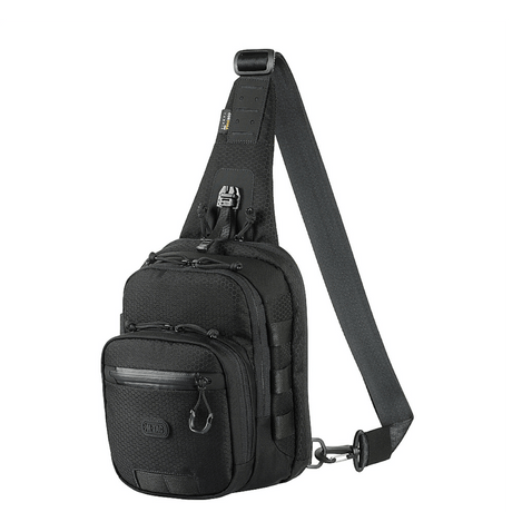 M-Tac Cross Taske Slim Elite Hex mustassa Cordura-materiaalissa, säädettävällä remmillä ja kestävillä YKK-vetoketjuilla, tyylikäs ja käytännöllinen päivittäiseen käyttöön.