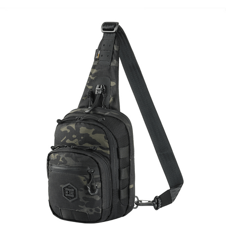 M-Tac Cross Taske Slim Elite Hex Cordura Hex- ja Cordura 500 -materiaaleista, säädettävällä remmillä camo-kuosissa, tyylikäs ja toimiva.