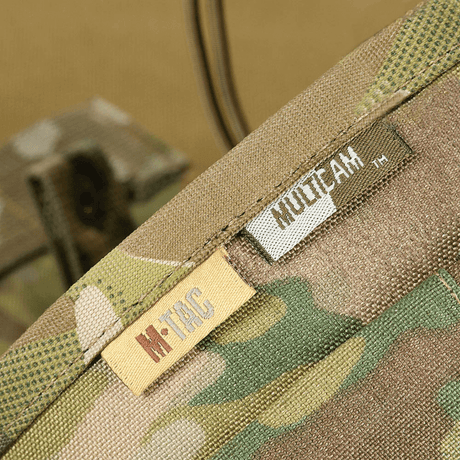 M‑Tac Magasinsæk Dump Pouch Lite Elite maastokuvioisena Cordura 500D:llä, M‑Tac- ja Multicam-merkinnät, kestävä ja käytännöllinen muotoilu.