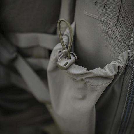 M-Tac STURM Elite Rygsæk med elastisk sidelomme og holdbar Cordura-konstruktion, ideel til taktisk brug og feltudstyr.