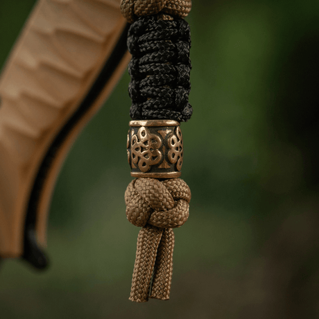 M-Tac Lanyard Scandinavian Small Chinese Knot koristehelmellä. Tyylikäs lisävaruste kierretystä paracordista, ihanteellinen veitsille ja taskulampuille.