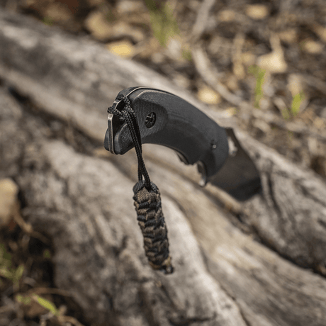 M-Tac Knife Lanyard Helix Skull tyylikäs punottu paracord-lanyard taskuveitselle, lisää luonnetta ja toimivuutta.