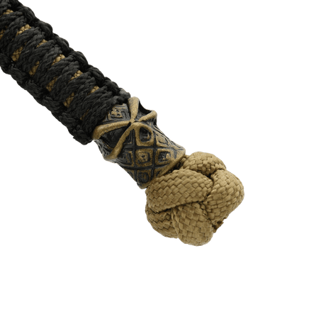 M-Tac Ninja Ver.2 Lanyard punotulla paracordilla ja ninja-helmi-koristeella, käytännöllinen lisävaruste veitselle tai muulle varusteelle.