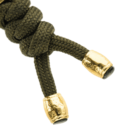 M-Tac Zeus Lanyard, punottu paracord ja tyylikäs muotoilu kultaisilla päillä, sopii veitselle ja varusteille.