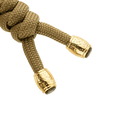 M-Tac Zeus Lanyard, punottu paracord kultaisilla päillä, täydellinen veitsille, taskulampuille ja varusteille. Joustava jatke nopeaan käyttöön.