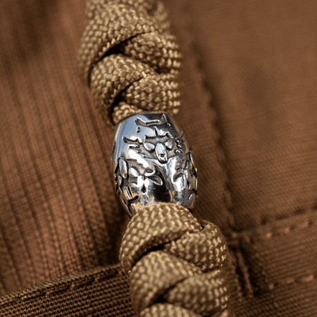 M-Tac Zeus Stainless Steel Lanyard punotulla paracordilla ja koristehelmellä, ihanteellinen nopeaan pääsyyn veitseen ja varusteisiin.