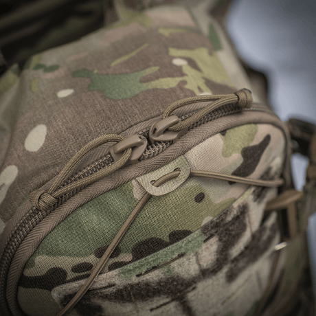 M-Tac reppu Sturm Elite Gen.II maastokankaasta vahvoilla vetoketjuilla ja MOLLE Laser Cut -järjestelmällä lisävarusteille.
